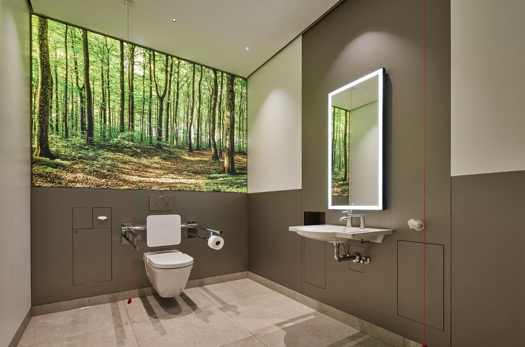 LED-Displays in den halb-öffentlichen Toiletten im B-Wohnen von Brillux